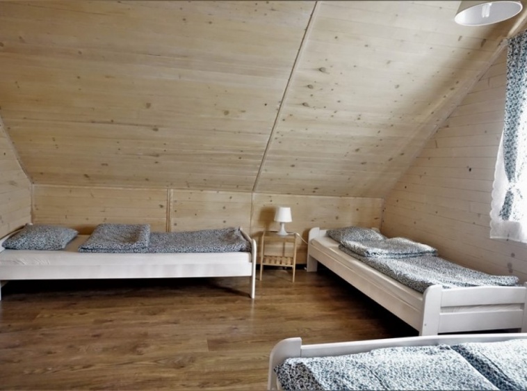 Domki Letniskowe Balos Sypialnia w domku 7/8 os dla czterech osób
