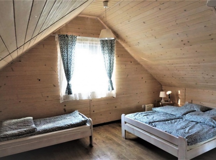 Domki Letniskowe Balos Sypialnia w domku 7/8 osobowym dla 4 osób