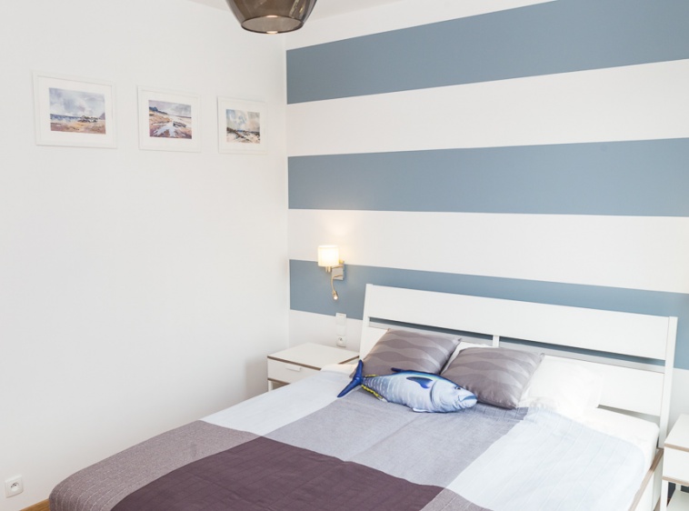Apartament KLIF Przytulna sypialnia z szerokim łóżkiem ...