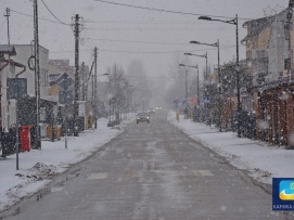 Ulica Kopernika w zimowej scenerii.