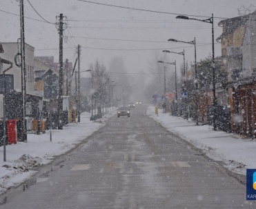 Ulica Kopernika w zimowej scenerii.
